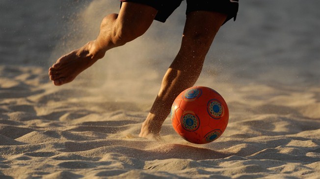 Beach voetbal op het strand bedrijfsuitje